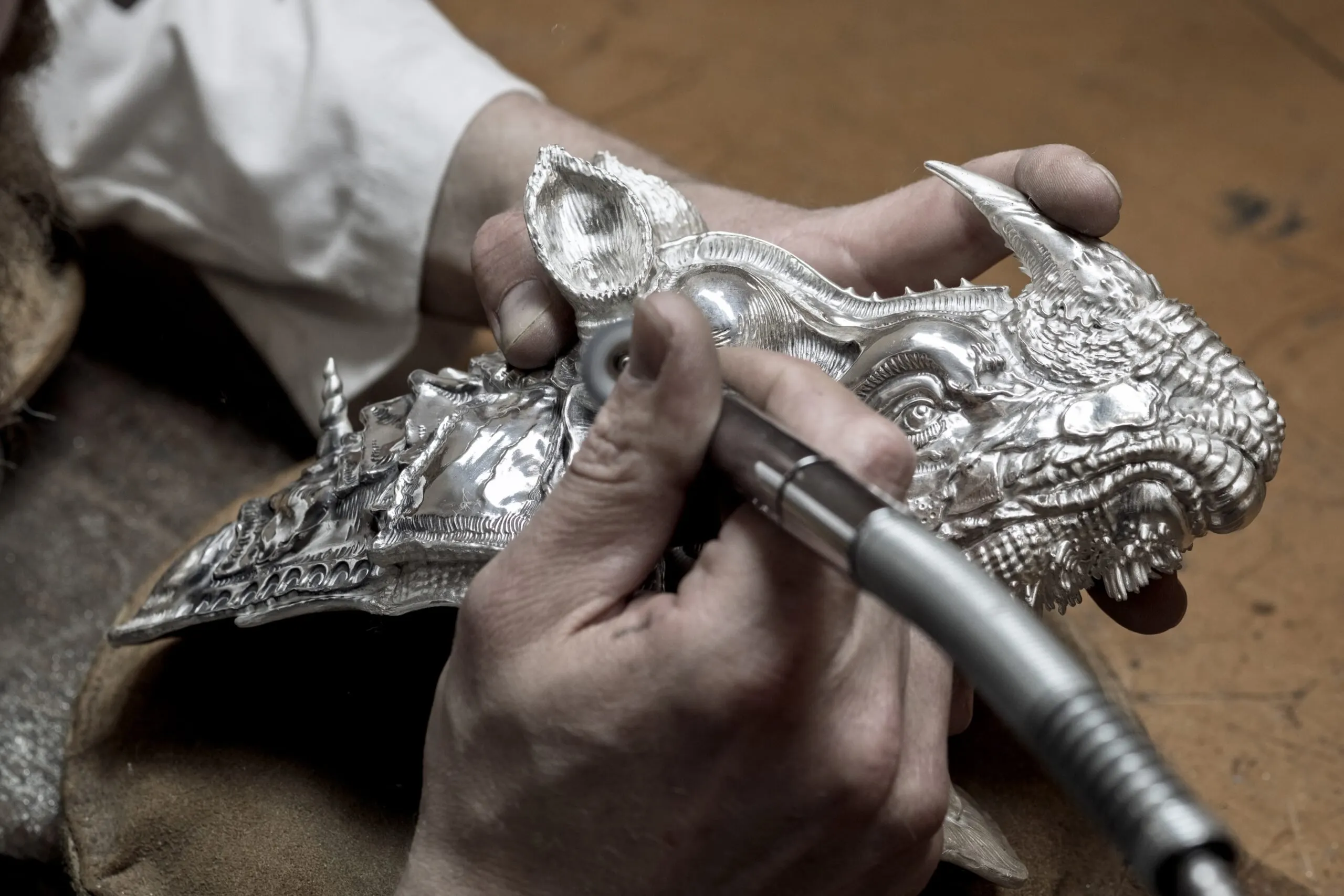 Silver sculptor at work.