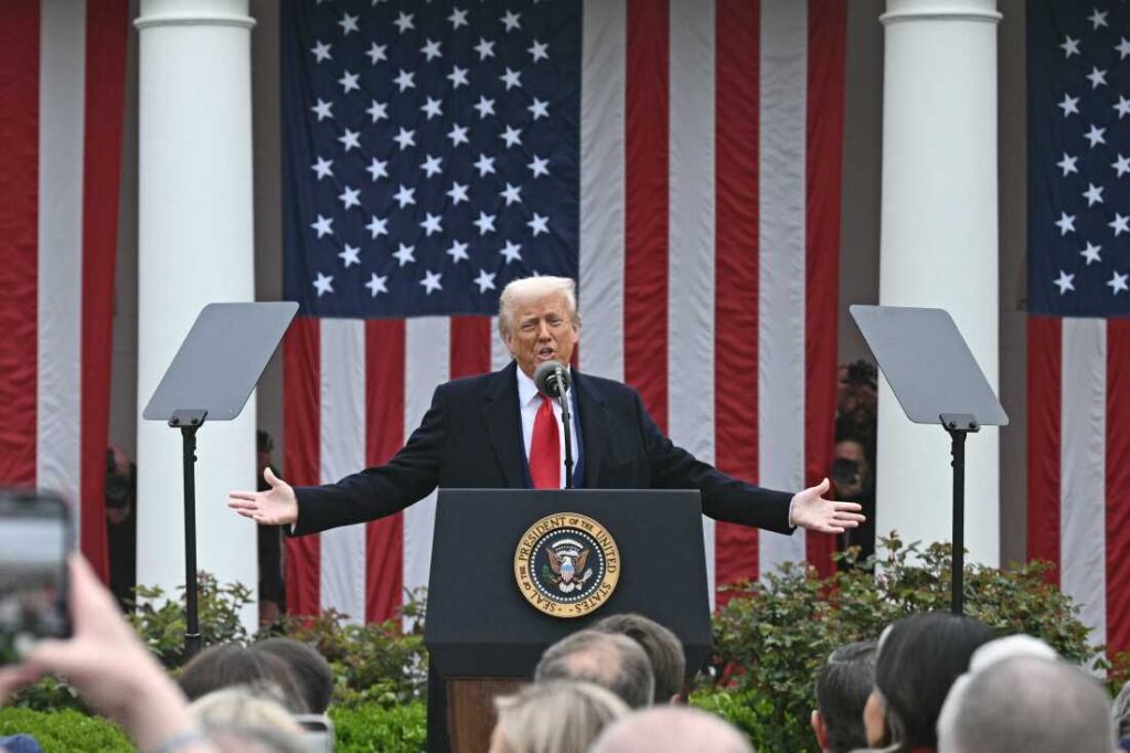 President speaking at podium with American flag backdrop
